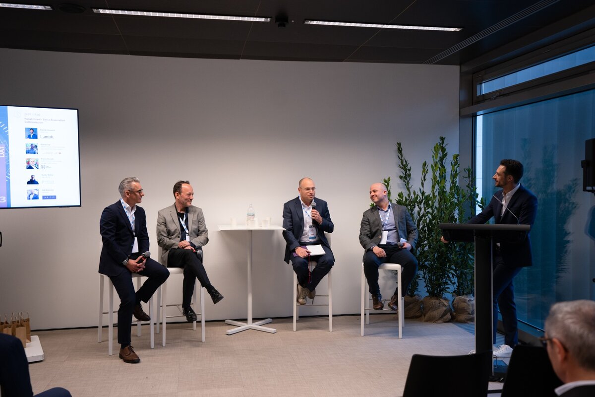 Sascha Weber on panel at industry conference